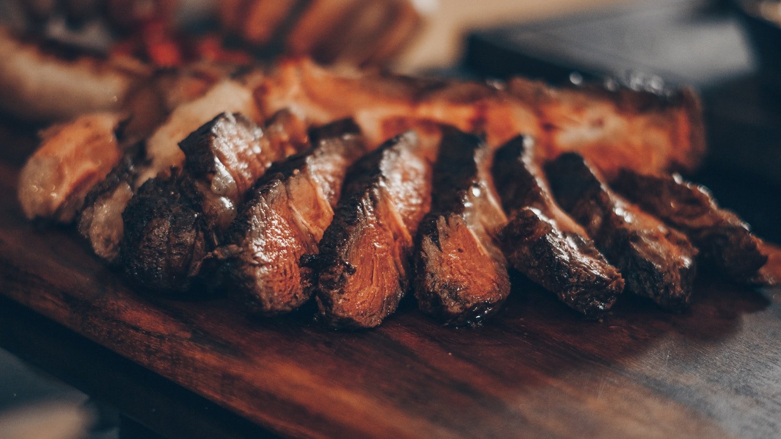 Close up of sliced brisket with dark bark crust