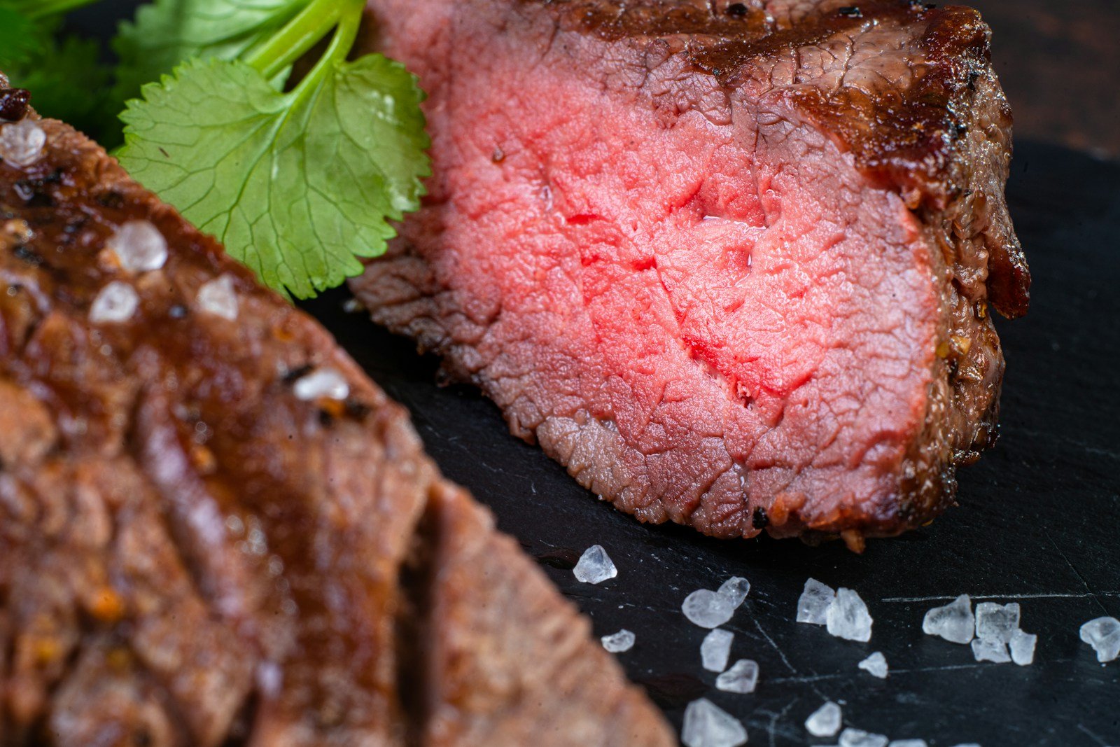 Sliced picanha steak served with coarse rock salt